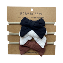 Load image into Gallery viewer, OUR HEADBAND SET includes three bows made of 100% cotton muslin. The soft elastic headband ensures that the bows fit comfortably on newborns and toddlers alike. Wash in no more than 30°C temperature. These bows are suitable for everyday wear and special occasions - and this set makes a perfect accessory for your baby boss! Dubai, Abu Dhabi, UAE.