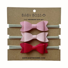 Load image into Gallery viewer, OUR HEADBAND SET includes three bows. The soft elastic headband ensures that the bows fit comfortably on newborns and toddlers alike. These bows are suitable for everyday wear and special occasions - and this set makes a perfect accessory for your baby boss! Dubai, Abu Dhabi, UAE.