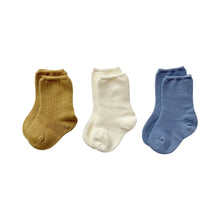 Load image into Gallery viewer, These socks are made of cotton with stretchable spandex and polyester – and are ideal for everyday use. Each set includes 3 pairs of socks - and there are 4 different sets to choose from. Suitable for babies and toddlers. Dubai, Abu Dhabi, UAE.