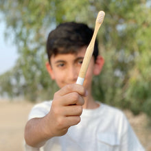 Load image into Gallery viewer, Baby Boss ME toothbrush is a sustainable alternative to regular non-recyclable plastic toothbrushes. The biodegradable handle is made of BPA free, organic and sustainably-grown bamboo, and for the bristles we have used extra soft BPA free nylon. Eco-friendly kids toothbrush, toddler toothbrush. Dubai, Abu Dhabi, UAE.