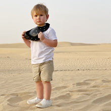 Load image into Gallery viewer, Baby Boss ME bib is made of ultra-soft food grade silicone (0% BPA, PVC and phthalates) and it comes with a comfortable & adjustable neck strap and a large spill pocket. The design features a unique Arabic alphabet pattern. The bib is quick and easy to clean, and the bib packaging is 100% biodegradable. Baby bib, kids bib, toddler bib. Dubai, Abu Dhabi, UAE.