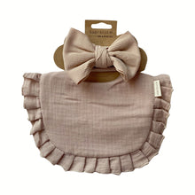 Load image into Gallery viewer, This set includes a cute drool bib and a matching headband bow. The absorbent multi-layer bib is made of 100% soft muslin cotton and it is easy to snap on a baby. The bow is made of stretchy ribbed cotton and can be used with the matching bib or styled with any outfit. The set is suitable for newborns and toddlers alike. Dubai, Abu Dhabi, UAE
