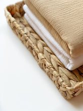 Load image into Gallery viewer, Baby Boss Baby Hooded Towel is made from extra soft, non-irritable and absorbent 4-layered organic cotton muslin which is perfect for wrapping your baby boss after their bath time. The towel contains no harmful dye or chemicals and is suitable for newborns and toddlers alike. The generous size of the towel and the practical hood ensure that your baby is kept dry and warm from head to toe. Dubai, Abu Dhabi, UAE
