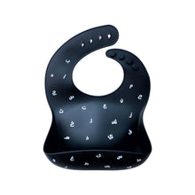 Load image into Gallery viewer, Baby Boss ME bib is made of ultra-soft food grade silicone (0% BPA, PVC and phthalates) and it comes with a comfortable &amp; adjustable neck strap and a large spill pocket. The design features a unique Arabic alphabet pattern. The bib is quick and easy to clean, and the bib packaging is 100% biodegradable. Baby bib, kids bib, toddler bib. Dubai, Abu Dhabi, UAE. 
