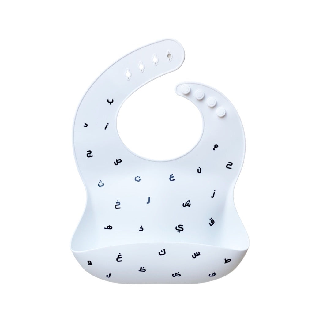Baby Boss ME bib is made of ultra-soft food grade silicone (0% BPA, PVC and phthalates) and it comes with a comfortable & adjustable neck strap and a large spill pocket. The design features a unique Arabic alphabet pattern. The bib is quick and easy to clean, and the bib packaging is 100% biodegradable. Baby bib, kids bib, toddler bib. Dubai, Abu Dhabi, UAE. 